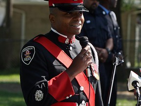 Const. Mike Akpata speaks during a service to commemorate the hiring of Alton Parker at Alton C. Parker park in Windsor on Friday, August 3, 2012. (The Windsor Star / TYLER BROWNBRIDGE)