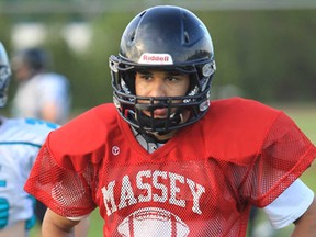 Essex QB Brandon Reaume threw for three TDs and ran for another in the Ravens' 52-0 win over the Sault Sabercats Saturday in Essex. (JASON KRYK/ The Windsor Star)