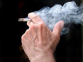 A man smokes a cigarette. (Windsor Star files)