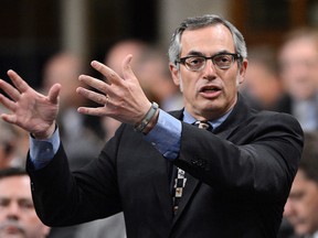 Canada's striking foreign-service officers have escalated their job action to 15 major embassies, and accused accused Treasury Board President Tony Clement of negotiating in bad faith. (Canadian Press files)