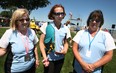 Marcia Fuglewicz, left, Arlene Thompson and Cathy Moroun, are members of the WonderBroads dragon boat team that won the  International Dragon Boat Festival for the Cure in Tecumseh on Saturday, July 13, 2013.  (DAX MELMER/The Windsor Star)