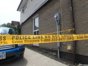 Police tape surrounds a home on Bayswater Crescent in Windsor as investigators search for clues in a suspicious death.  Major crime investigators are on scene at the east Windsor home. (JASON KRYK/The Windsor Star)