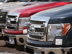 U.S. Ford F150 trucks are displayed on June 3, 2013 in Melrose Park, Illinois. Ford F-Series trucks posted a 31 per cent increase in sales in May over the previous year, the best sales for the month since 2005.  (Scott Olson/Getty Images)