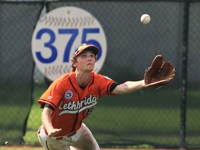 Lethbridge outfielder Luke Hughson prepares to make a diving catch  during the Canadian Big League Championships against Windsor at Soulliere Field in Windsor Wednesday. (JASON KRYK/The Windsor Star)