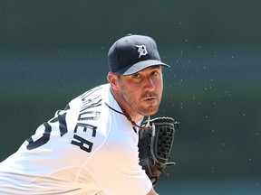 Justin Verlander of the Detroit Tigers warms up prior to the start of the game against the Texas Rangers at Comerica Park Sunday. (Photo by Leon Halip/Getty Images)