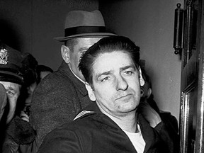 This Feb. 25, 1967, file photo shows self-confessed Boston Strangler Albert DeSalvo minutes after his capture in Boston. DeSalvo confessed to the string of 1960s killings but was never convicted. He died in prison in the 1970s. Massachusetts officials said Thursday, July 11, 2013, that DNA technology led to a breakthrough, putting them in a position to formally charge the Boston Strangler with the murder of Mary Sullivan, last of the slayings attributed to the Boston Strangler. (AP Photo, File)