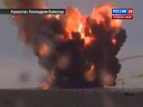 In this frame grab made from TV footage distributed by Russian Vesti 24 channel Russian booster rocket carrying three satellites crashes at a Russia-leased cosmodrome in Kazakhstan on Tuesday July 2, 2013 shortly after the launch The Proton-M booster unexpectedly shut down the engine 17 seconds into the flight and crashed some 2 kilometers (over a mile) away from the Baikonur launch pad, the Russian Space Agency said in a statement. (AP Photo/ Vesti 24 via APTN)