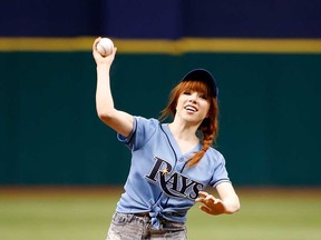 Singer Carly Rae Jepsen throws out the ceremonial first pitch just before the start of the game between the Tampa Bay Rays and the Houston Astros at Tropicana Field on July 14, 2013 in St. Petersburg, Fla.  (J. Meric/Getty Images)