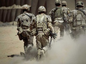 Canadian soldiers shown on patrol outside Salavat, in the Panjwayi district, southwest of Kandahar, Afghanistan, Monday, June 7, 2010. (THE CANADIAN PRESS/AP/Anja Niedringhaus)