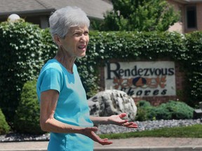 Mira Gates, a resident of the Rendezvous Shores subdivision in Windsor, Ont., speaks Thursday, July 25, 2013, about the cougar she claims she spotted near her Riverside Drive home. (DAN JANISSE/The Windsor Star)