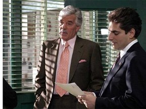 In this undated photo from NBC Universal, Dennis Farina, who plays New York Police Detective Joe Fontana, acts in a scene with Michael Imperioli in the role of Detective Nick Falco, in an episode from NBC's police drama,"Law & Order." Farina died suddenly on Monday, July 22, 2013, in Scottsdale, Ariz., after suffering a blood clot in his lung. He was 69. (AP Photo/ NBC Universal,Jessica Burstein)