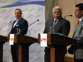 PC candidate Robert de Verteuil, left, NDP candidate Percy Hatfield and Liberal candidate Jeewan Gill take part in the Windsor-Essex Regional Chamber of Commerce debate for candidates in the Windsor-Tecumseh byelection at the Caboto Club in Windsor on Thursday, July 18, 2013.            (TYLER BROWNBRIDGE/The Windsor Star)