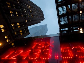 File photo of a tote board displaying the closing figure for the TSX for 2012 in Toronto, (Windsor Star files)