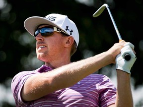 Hunter Mahan of the United States watches his tee shot during second round of the Canadian Open in Oakville, Ont., on Friday, July 26, 2013. Mahan, tournament leader at 13 under after 36 holes, has withdrawn from the open when his wife went into labour. (THE CANADIAN PRESS/Nathan Denette)