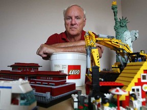 John St-Onge, 63, pictured at his home in Windsor, Ont., Tuesday, July 9, 2013, with a selection of his Lego collection, was turned away from the Vaughan Mills' Legoland on Saturday because he was not accompanying a child. (DAX MELMER for National Post)