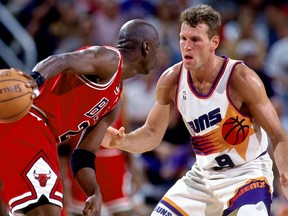 Chicago's Michael Jordan, left, is guarded by Dan Majerle of the Phoenix Suns in Game 1 of the 1993 NBA Finals.(Photo by Andrew D. Bernstein/NBAE via Getty Images)