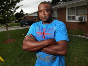 Adrian Montrose, a St. Lucian migrant worker, poses Monday, July 29, 2013, at his Windsor, Ont. residence. The Human Rights Tribunal of Ontario awarded him $23,500 in compensation due to racial discrimination he suffered from a greenhouse grower in Kingsville. (DAN JANISSE/The Windsor Star)