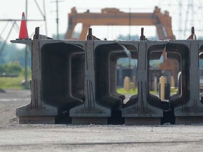 Girders being used for the Herb Gray Parkway are pictured at a storage facility on Russell Street in West Windsor, Monday, July 22, 2013.  (DAX MELMER/The Windsor Star)