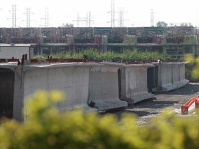 Girders being used for the Herb Gray Parkway are pictured at a storage facility on Russell Street in West Windsor, Monday, July 22, 2013.  (DAX MELMER/The Windsor Star)