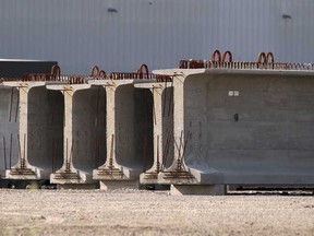 Girders being used for the Herb Gray Parkway are pictured at a storage facility on Russell Street in West Windsor, Monday, July 22, 2013.  (DAX MELMER/The Windsor Star)