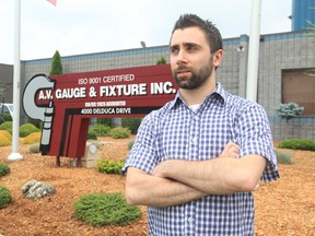 Paul Feimer, shown Friday, July 5, 2013, was hired as a CAD administrator at A.V. Guage & Fixture Inc. in Oldcastle, Ont.  (JASON KRYK/The Windsor Star)