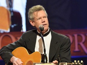 Country singer Randy Travis performs at the funeral service for George Jones at The Grand Ole Opry on May 2, 2013 in Nashville. Travis is in critical condition in a Texas hospital and was taken there Sunday, July 7, 2013.  (Photo by Rick Diamond/Getty Images for GJ Memorial)