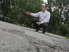 Ward 1 Councillor Drew Dilkens is shown Sunday, July 7, 2013, on Roselawn Drive, which is set to be repaved.  (DAX MELMER/The Windsor Star)