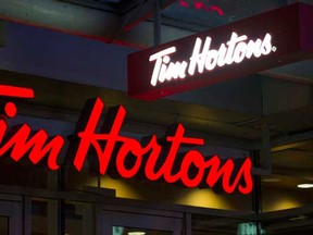 Tim Hortons signage is pictured in this undated file photo. (Jonathan Hayward , CP)