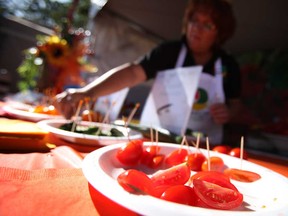 In this file photo, Tomato samples from the Ontario Greenhouse Vegetable Growers were offered at the free 2012 Leamington Tomato Festival at Seacliff Park Saturday, Aug. 18, 2012. (Windsor Star files)