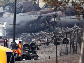 This photo provided July 8, 2013 by Surete du Quebec, shows wrecked oil tankers and debris from a runaway train that derailed and exploded in Lac-Megantic, Quebec, Canada. (AFP PHOTO/ HO / Surete du Quebec)