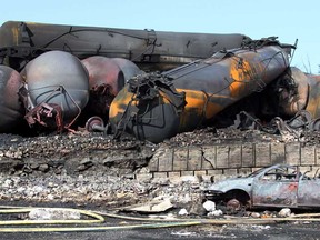 Canada's railway industry has intensified its lobbying efforts since a train wreck in Lac-Megantic, Que., killed 47 people on July 8, 2013. The tragedy has raised questions about transport safety. (AFP/Surete du Quebec)