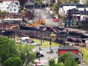 Exploded MMA train wagons that carried crude oil seen at the explosion site in Lac-Mégantic, 370 kilometres southeast of Montreal on Tuesday, July 23, 2013. (Dario Ayala, The Gazette)