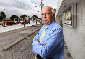 Rick Merlo, founder of Merlo's Formal Sales, is shown at his Walker Road business, Tuesday, July 2, 2013, in Windsor, Ont. Merlo says the continuous roadwork in front of his store over the past 13 years has taken its toll and he will be forced to close the business. (DAN JANISSE/The Windsor Star)