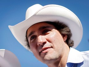 Liberal leader Justin Trudeau attends a Stampede breakfast in Calgary, Alta., Sunday, July 7, 2013. Trudeau has changed his position on the decriminalization of marijuana and now wants to see the drug legalized, taxed and regulated, a stance that has drawn the ire of the Conservative government but applause from pot activists.THE CANADIAN PRESS/Jeff McIntosh