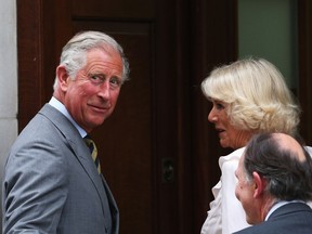 Prince Charles, Prince of Wales and Camilla, Duchess of Cornwall arrive at The Lindo Wing before visiting Catherine, Duchess Of Cambridge and her newborn son at St Mary's Hospital on July 23, 2013 in London, England. The Duchess of Cambridge yesterday gave birth to a boy at 16.24 BST and weighing 81b 6oz, with Prince William at her side. The baby, as yet unnamed, is third in line to the throne and becomes the Prince of Cambridge. (Photo by Oli Scarff/Getty Images)