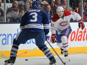 Montreal's Lars Eller, right, is watched by Toronto's Dion Phaneuf at the Air Canada Centre. (Photo by Claus Andersen/Getty Images)