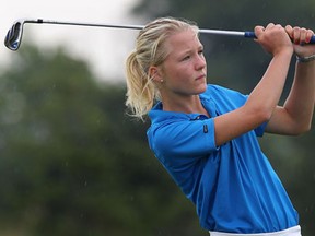 Wheatley's Ivy Dresser hits a shot Monday at Woodland Hills Golf Club in Lakeshore. (DAN JANISSE/The Windsor Star)