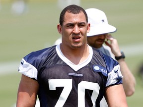 Windsor's Tyrone Crawford takes a break during Dallas Cowboys minicamp last year in Irving, Texas. (Photo by Layne Murdoch/Getty Images)