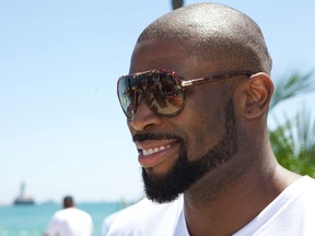 Lions defensive lineman Israel Idonije attends a corporate outing in Chicago earlier this month. (Photo by Jeff Schear/Getty Images for Michigan Avenue Magazine)