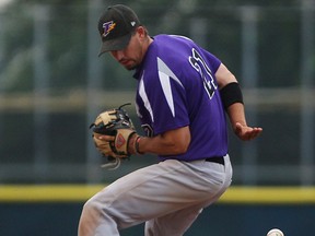 Tecumseh Thunder infielder Ryan Kerstens fields a ground ball against the Windsor Stars at Cullen Field Friday. (DAX MELMER/The Windsor Star)