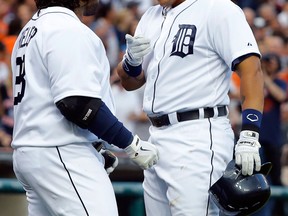 Detroit's Miguel Cabrera, right, celebrates his solo home run with Prince Fielder in the first inning against the Philadelphia Philles at Comerica Park Saturday. (Photo by Duane Burleson/Getty Images)