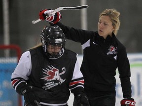 Olympic gold medalist Meghan Agosta-Marciano of Ruthven gives instructions during the opening day of her summer hockey camp Monday, July 8, 2013, at the WFCU Centre in Windsor, Ont.   (DAN JANISSE/The Windsor Star)