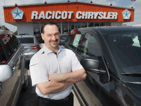 Chris Paniccia, business manager at Racicot Chrysler, is shown Tuesday, July 9, 2013, at the Amherstburg, Ont. dealership.     (DAN JANISSE/The Windsor Star)