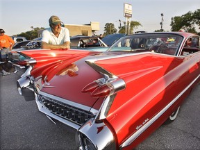Aug. 12, 2009: Car enthusiasts gathered at Dan Kane Chevrolet for the Woodward Dream Cruise tune-up, including Jack Grundy and his 1959 Cadillac Coupe de Ville. (Windsor Star files)
