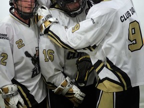 Windsor Clippers Jeff Rivait, left, Brendan Anger, and Lucas Ducharme celebrate a recent goal at Forest Glade Arena. The Clippers split a weekend playoff series against London and will host the Blue Devils in a decisive Game 3 Wednesday. (Windsor Star files)