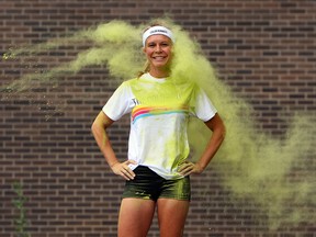 Windsor Star reporter Kelly Steele is covered with green powder prior to this weekends Color Run in Windsor on Tuesday, July 16, 2013.           (TYLER BROWNBRIDGE/The Windsor Star)