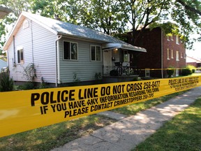 The crime scene at 828 Louis Ave. in Windsor, Ont. on July 28, 2012. (Jason Kryk / The Windsor Star)