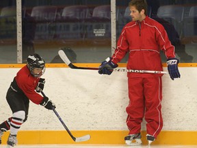 Former Windsor Spitfire Kenny Ryan (R) is shown Monday, July 29, 2013, at a youth hockey camp at the Tecumseh Arena. He and other professional players are participating in the camp. (DAN JANISSE/The Windsor Star)