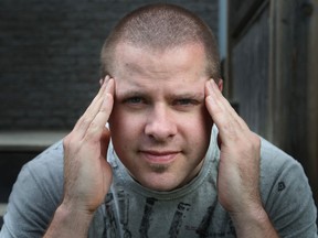 Jay Mallet, 36, who suffered a chronic headache for several months, is pictured at his home in South Windsor, Thursday, July 11, 2013.  (DAX MELMER/The Windsor Star)