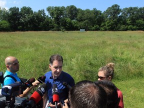 Windsor West MP Brian Masse holds a press conference at Black Oak Heritage Park, near Ojibway Shores, on July 12, 2013. (Jason Kryk / The Windsor Star)